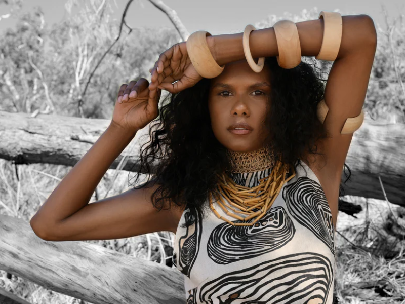Lady wearing a handmade dress and jewellry